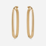 Elongated gold hoop earrings